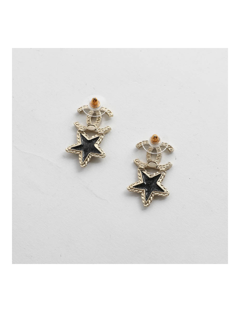 CHANEL clous d'oreille étoiles
