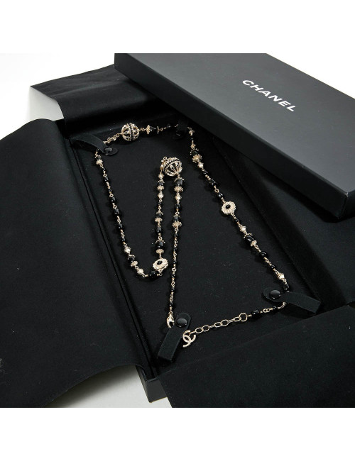 Sautoir CHANEL chaîne dorée et perles noires