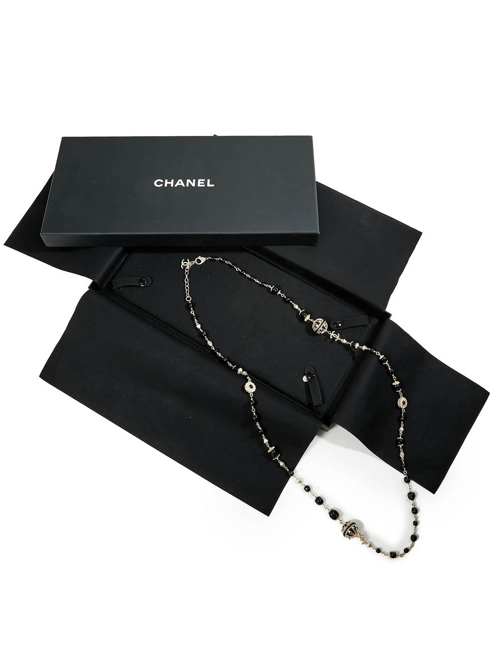 Sautoir CHANEL chaîne dorée et perles noires