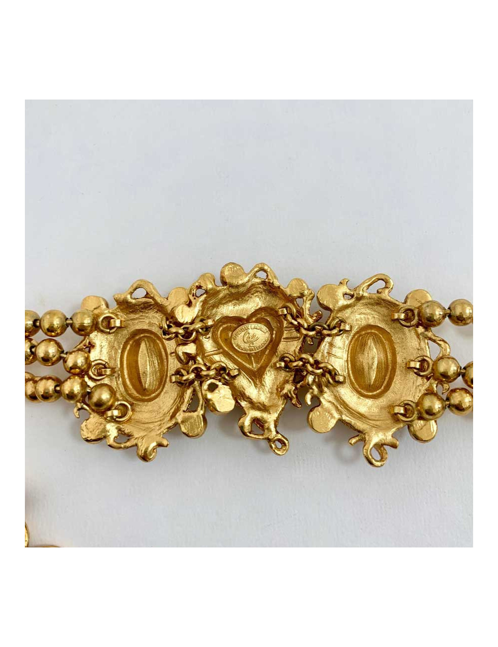 a reparer Pendentif CHRISTIAN LACROIX