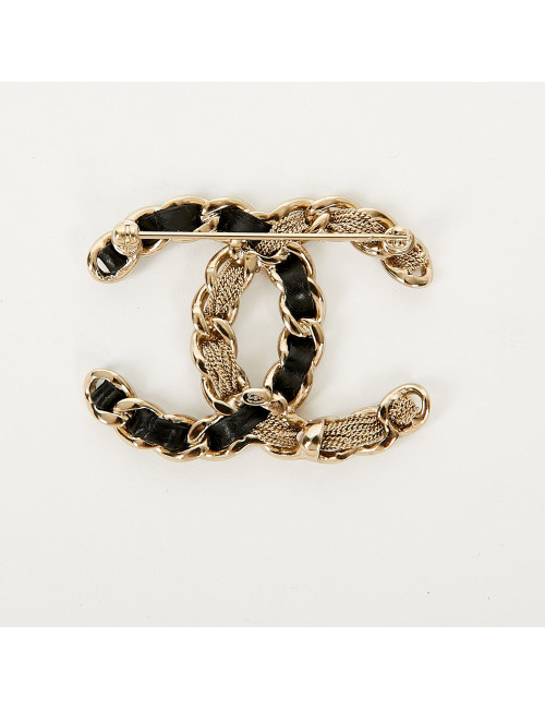 Broche CC métal entrelacé de cuir et fines chaines