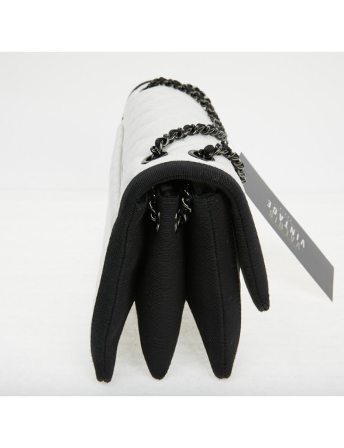 Sac à main Chanel cuir blanc gansé de noir