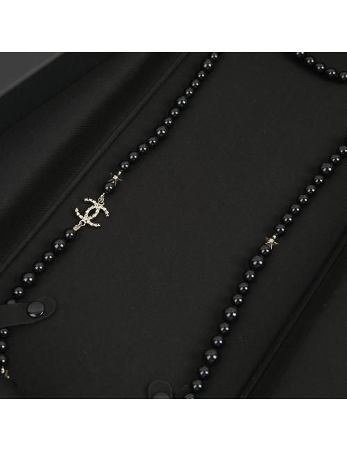 Sautoir CHANEL perles noires