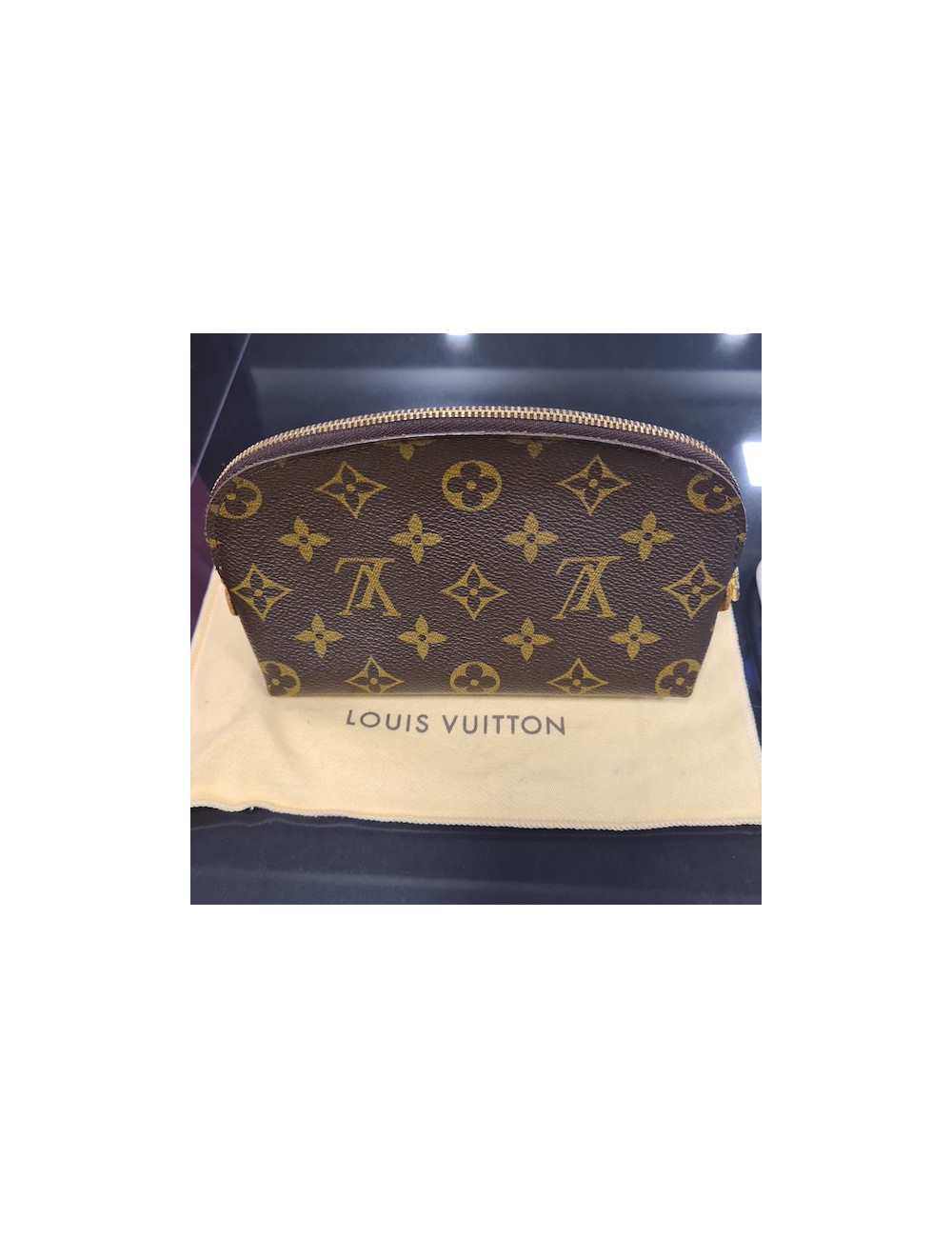 Trousse cosmétique LOUIS VUITTON en toile enduite Monogram