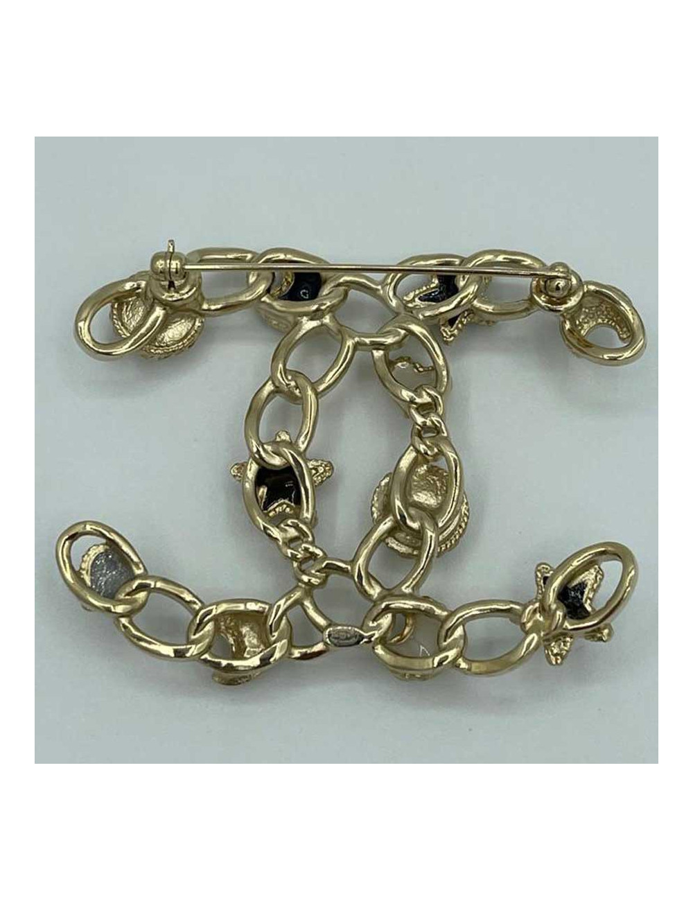 Broche Chanel CC perle strass