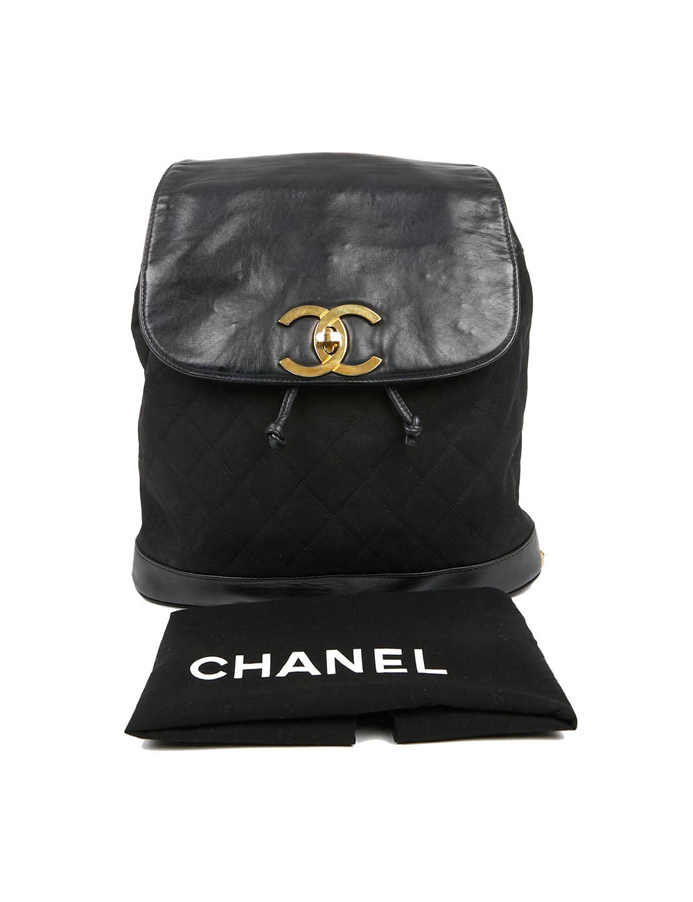 Sac a dos vintage CHANEL en toile et cuir bleu marine