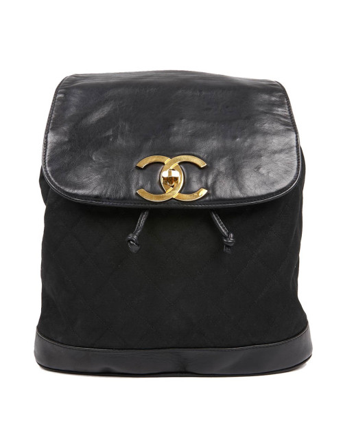 Sac a dos vintage CHANEL en toile et cuir bleu marine