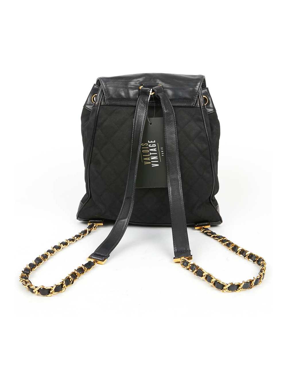 Sac a dos vintage CHANEL en toile et cuir bleu marine