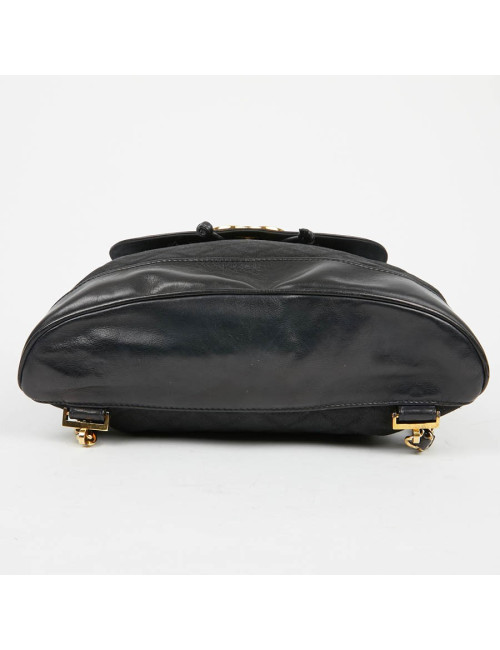 Sac a dos vintage CHANEL en toile et cuir bleu marine