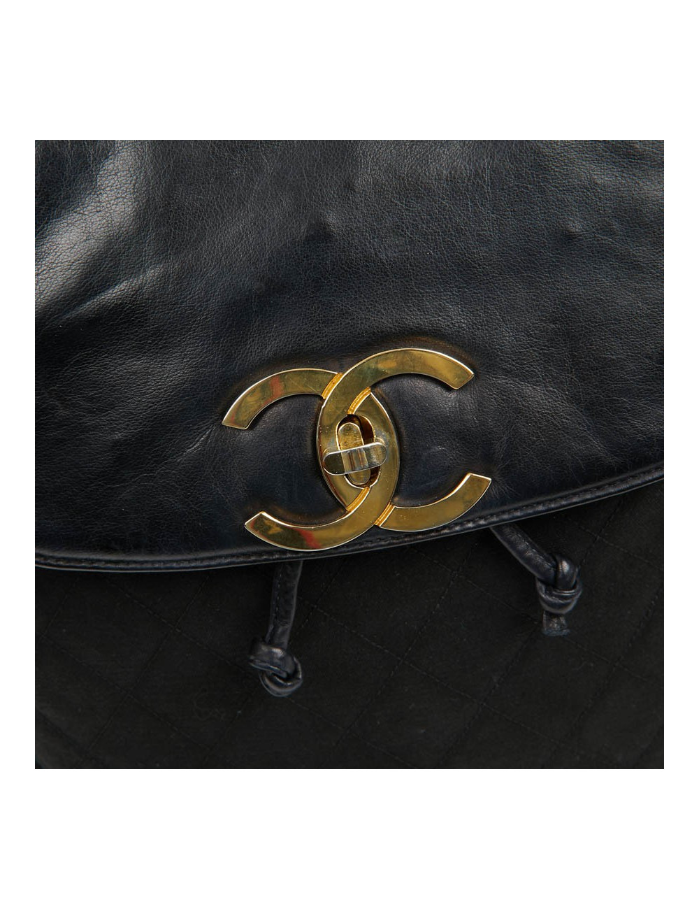 Sac a dos vintage CHANEL en toile et cuir bleu marine