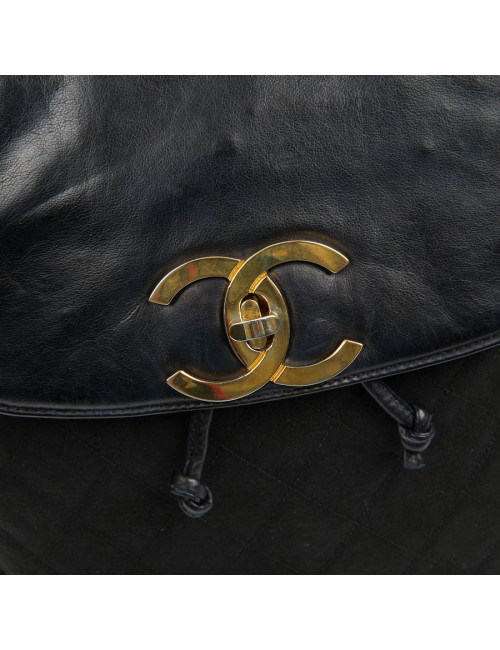 Sac a dos vintage CHANEL en toile et cuir bleu marine