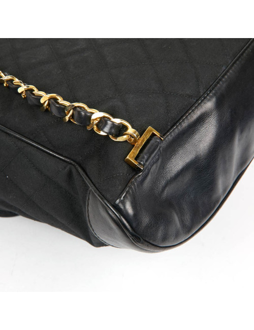 Sac a dos vintage CHANEL en toile et cuir bleu marine