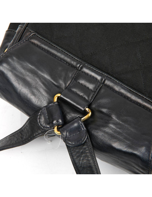 Sac a dos vintage CHANEL en toile et cuir bleu marine