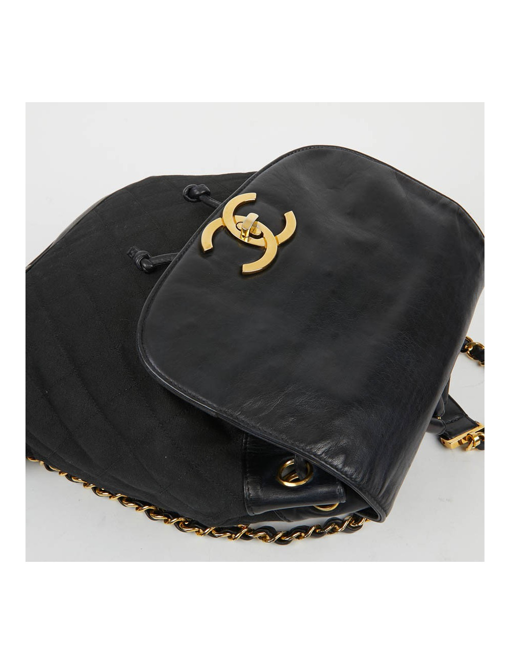 Sac a dos vintage CHANEL en toile et cuir bleu marine