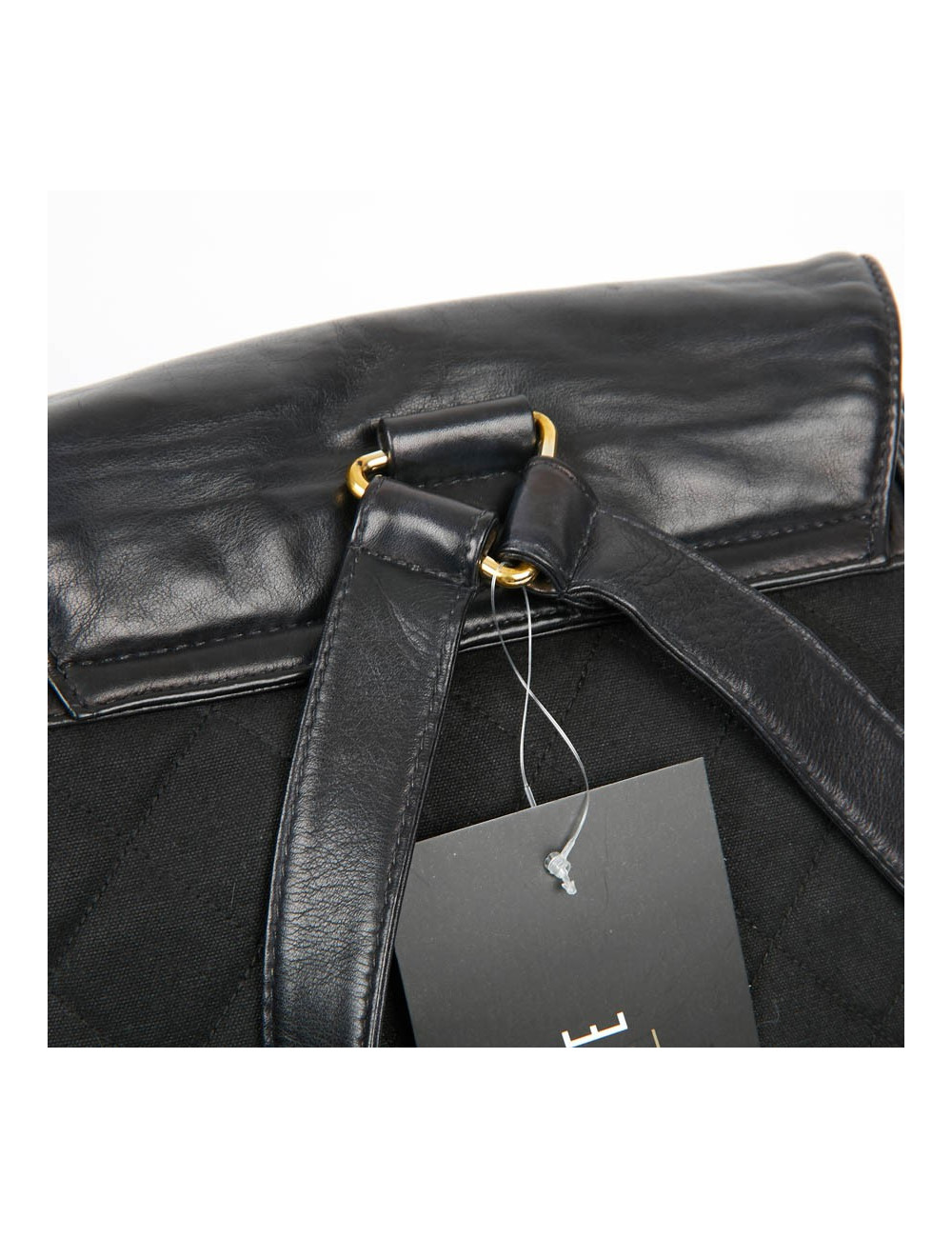 Sac a dos vintage CHANEL en toile et cuir bleu marine