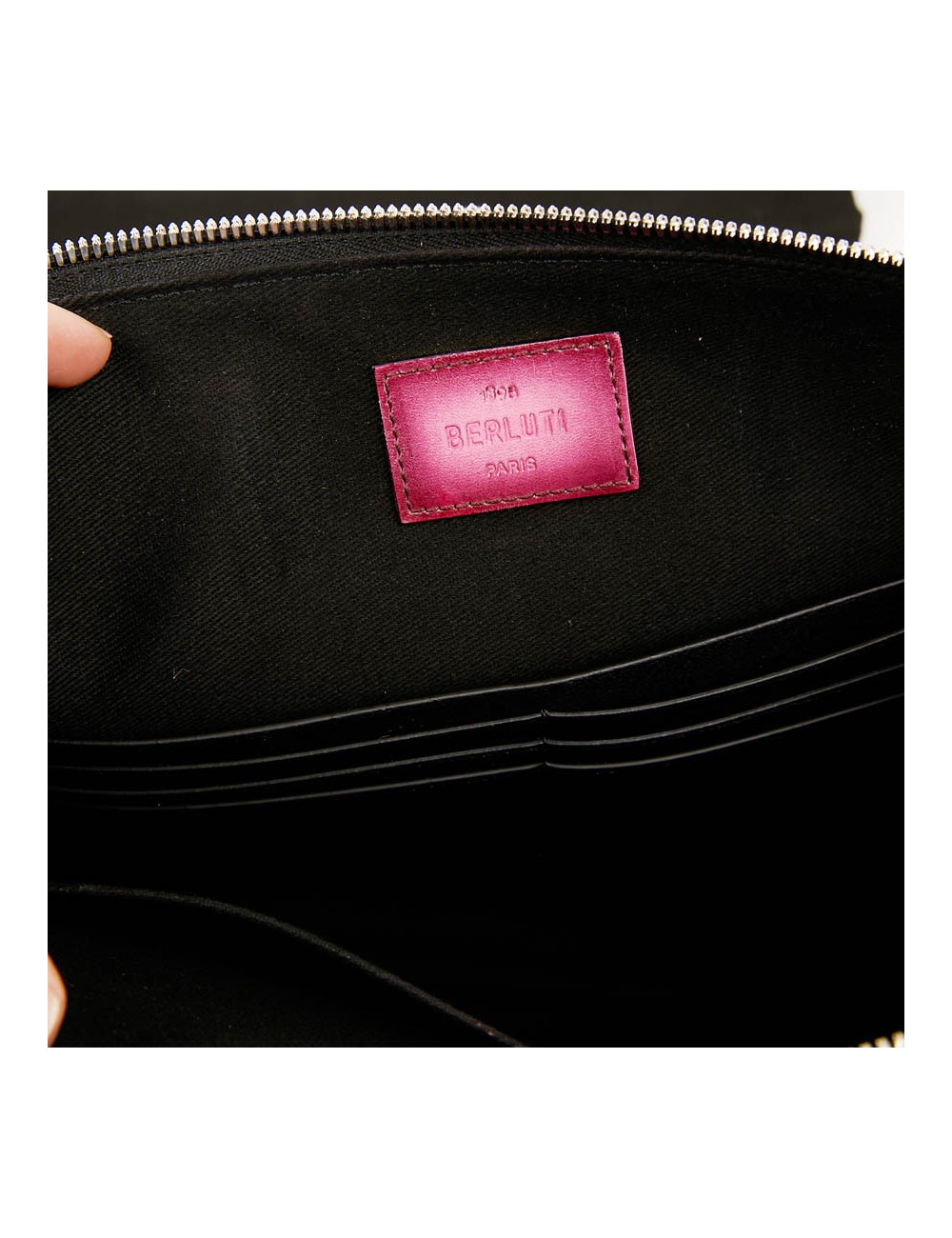 Pochette Nino BERLUTI en toile et cuir rose