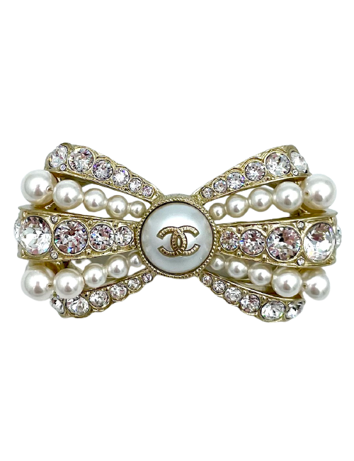 Broche CHANEL dorée perles et strass