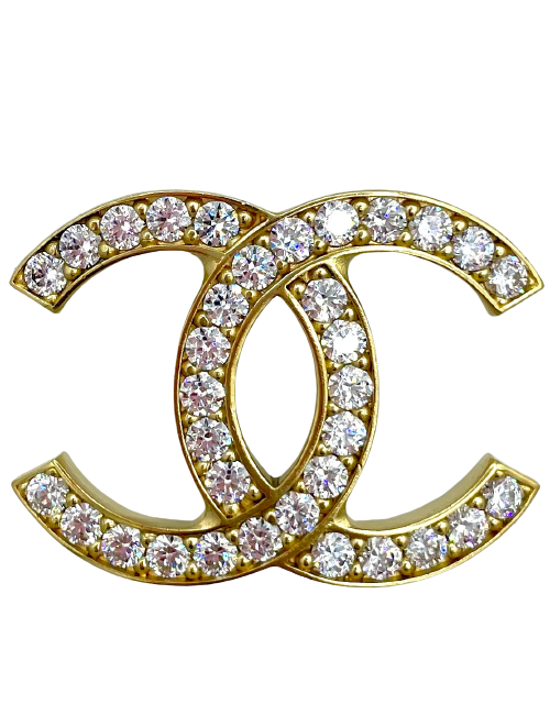 Broche CHANEL dorée et strass