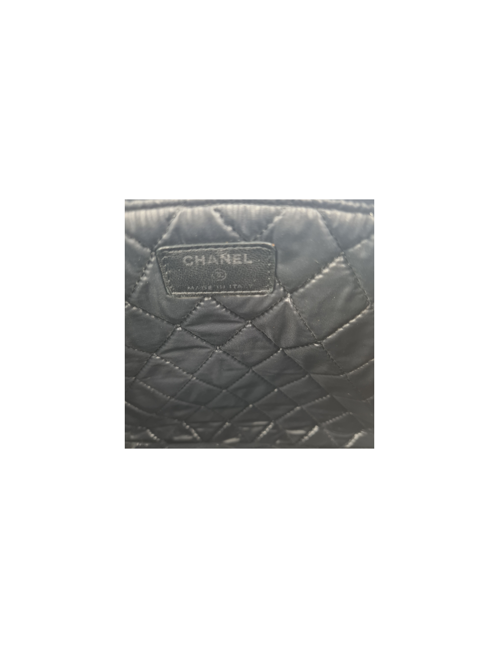 Pochette CHANEL matelassé perforée noire