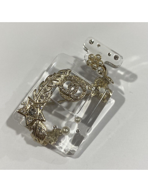 Broche bouteille CHANEL 