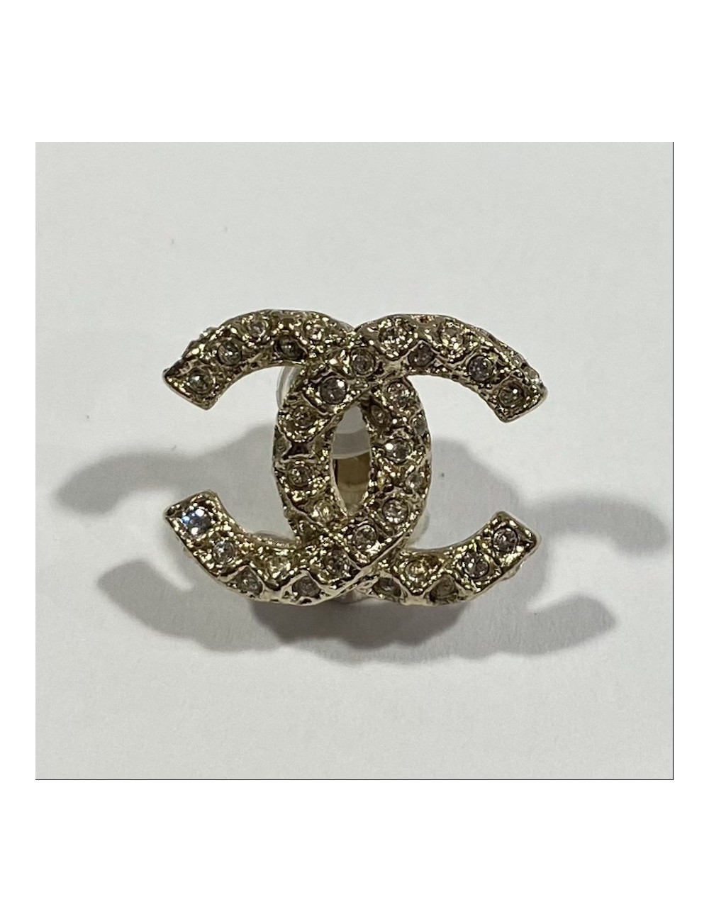 Clips d’oreille CHANEL dorés strass