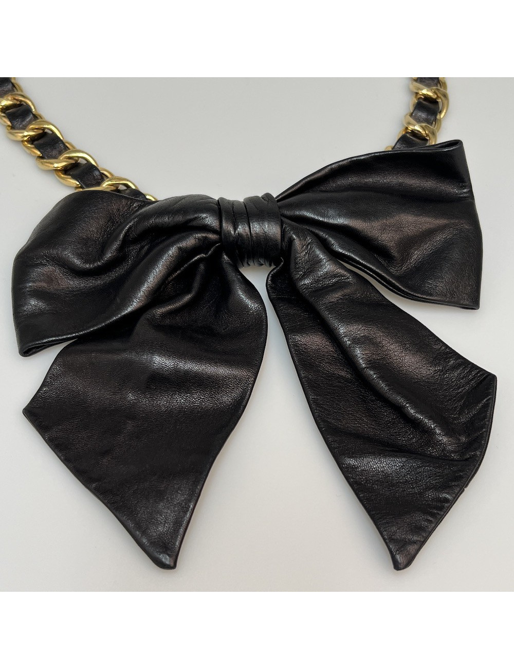 Ceinture CHANEL noeud chaine dorée