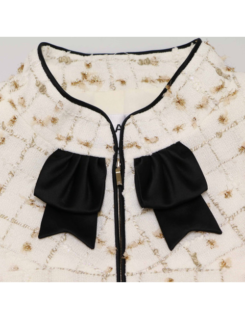 Veste CHANEL blanc et doré gansé de noir