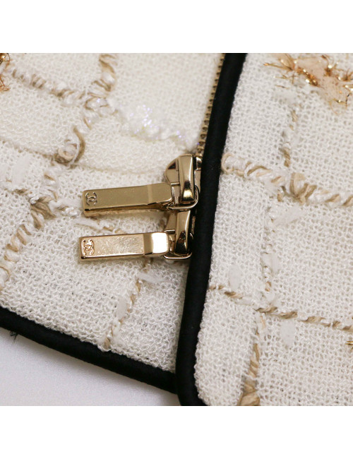 Veste CHANEL blanc et doré gansé de noir
