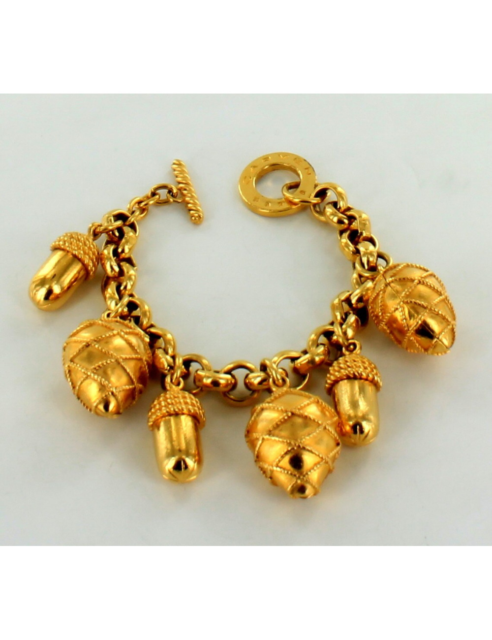 bracelet CARVEN à breloques dorées