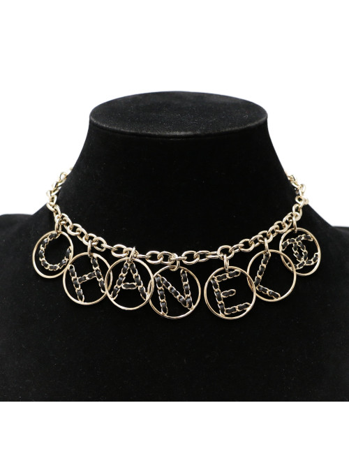 CHANEL light gold necklace spelling C H A N E L