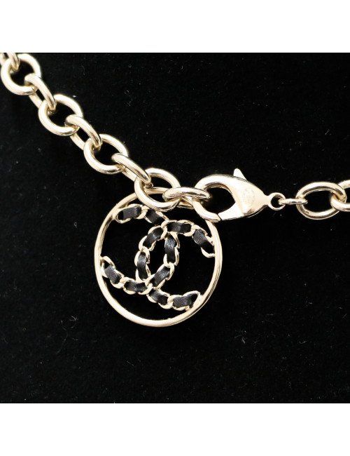 CHANEL light gold necklace spelling C H A N E L