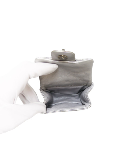 CHANEL silver leather mini charm bag