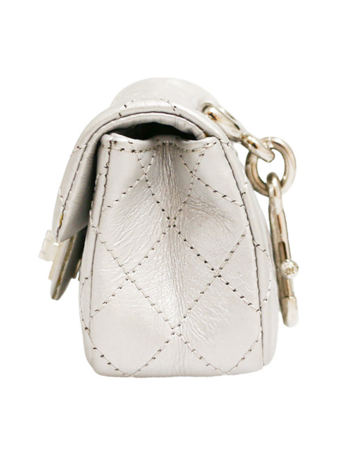CHANEL silver leather mini charm bag