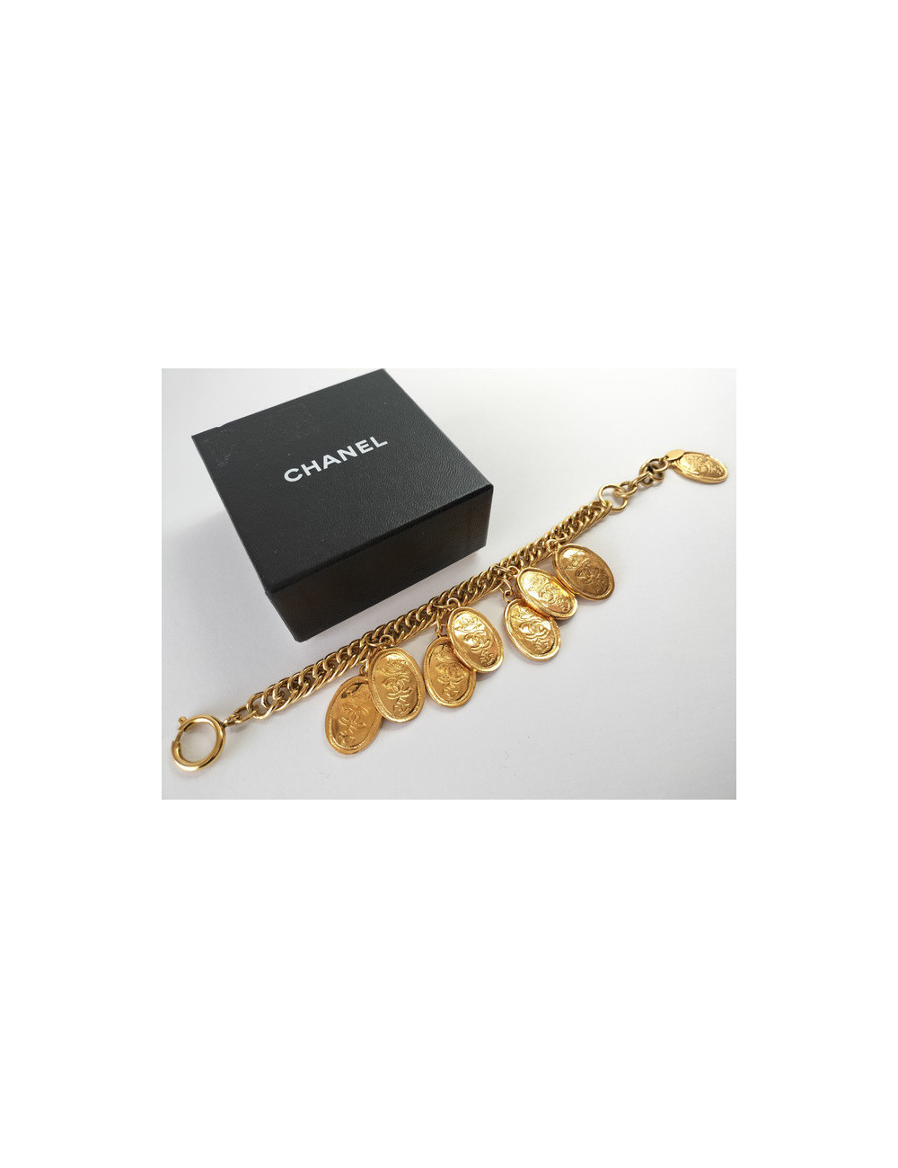 CHANEL golden bracelet with medals