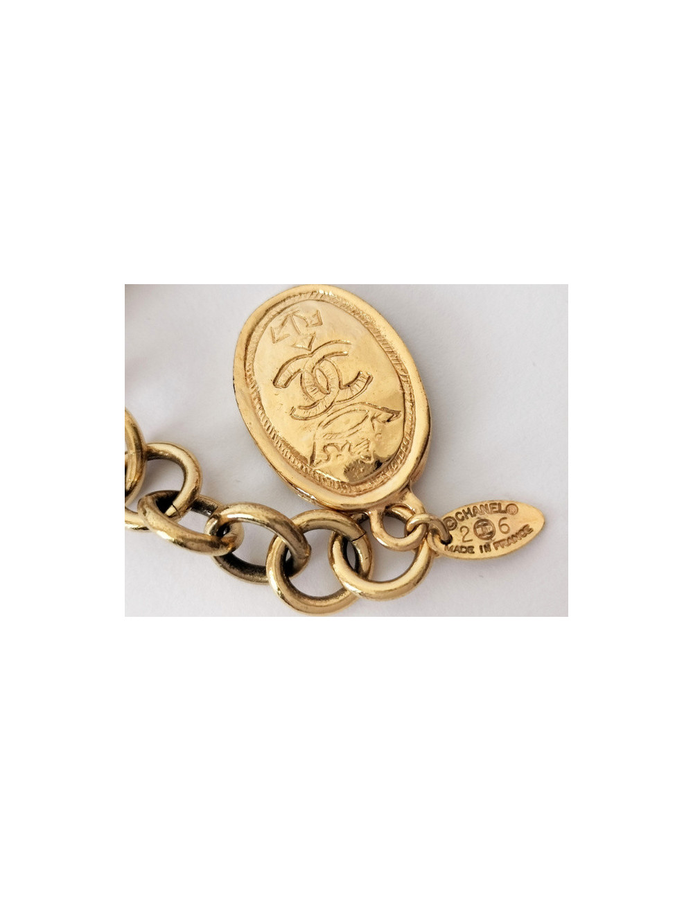 CHANEL golden bracelet with medals
