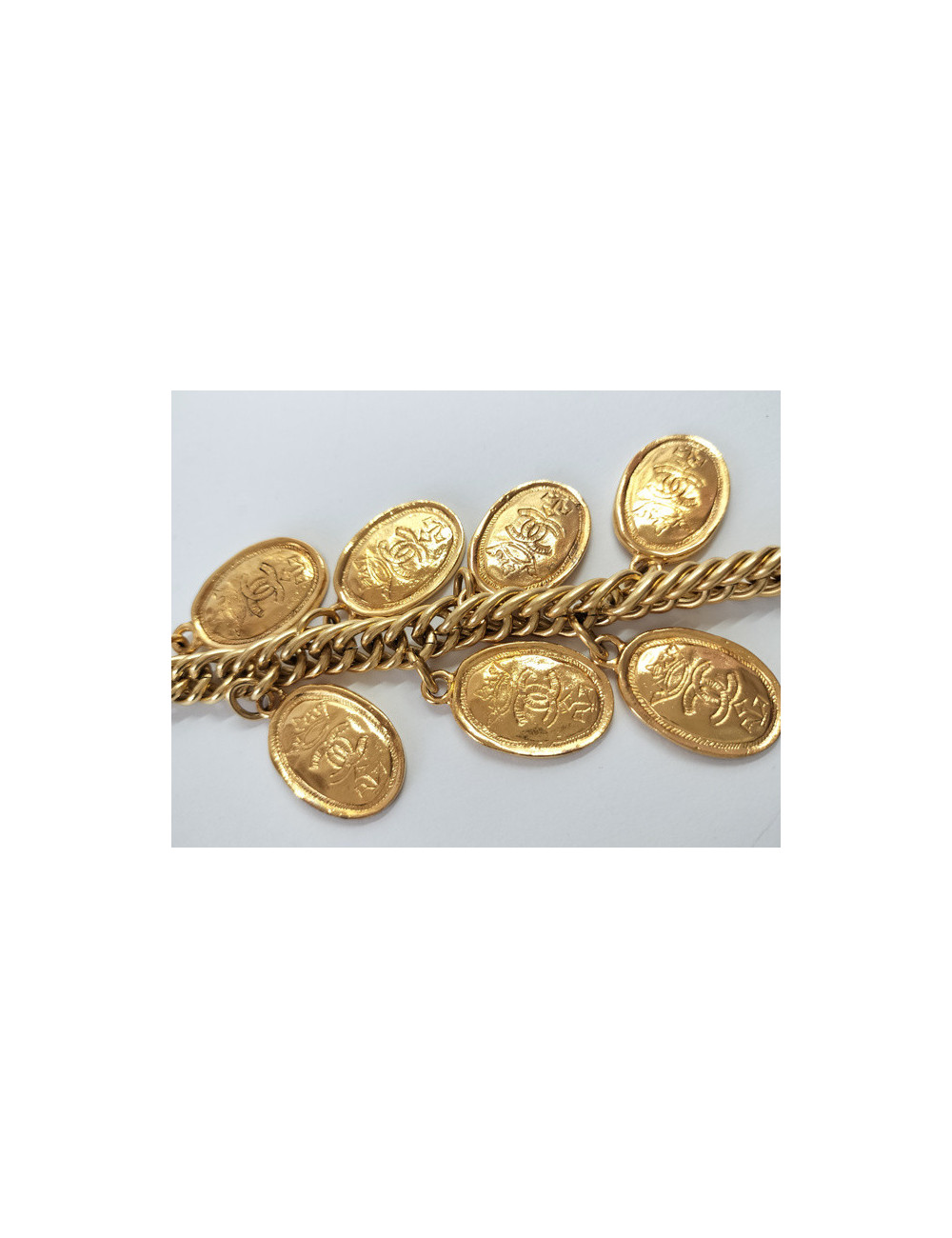 CHANEL golden bracelet with medals