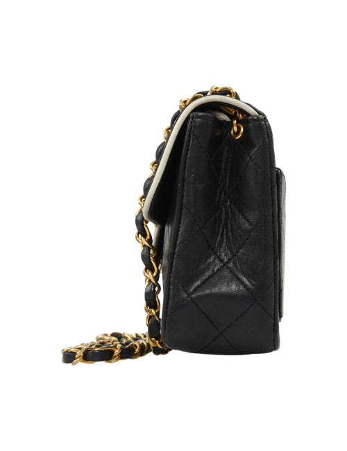 Petit sac vintage CHANEL noir gansé de blanc