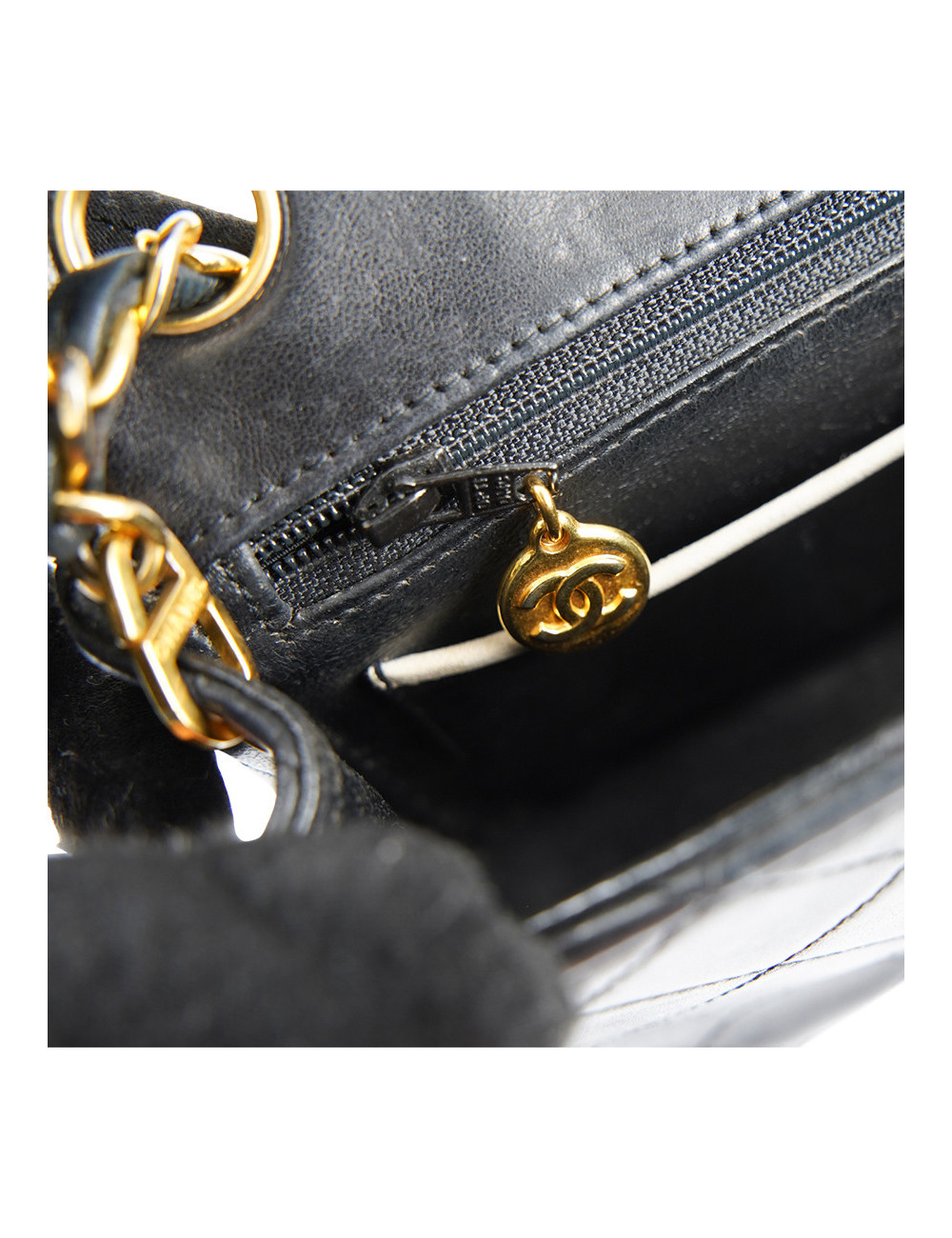 Petit sac vintage CHANEL noir gansé de blanc