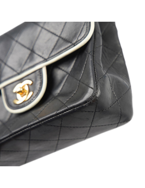 Petit sac vintage CHANEL noir gansé de blanc