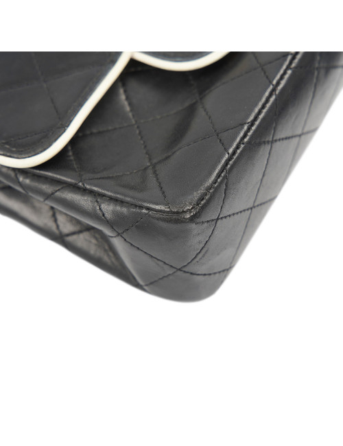 Petit sac vintage CHANEL noir gansé de blanc