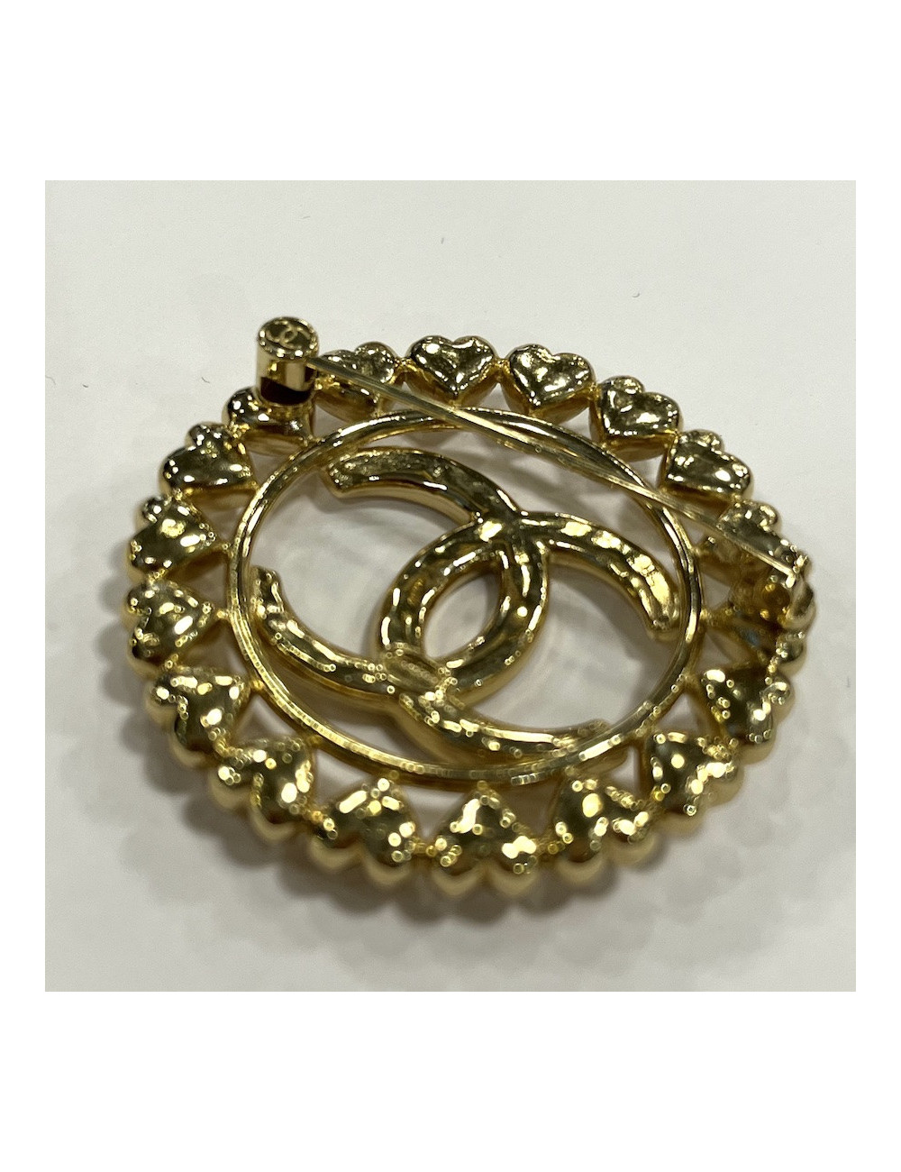 Broche CHANEL ronde dorée 