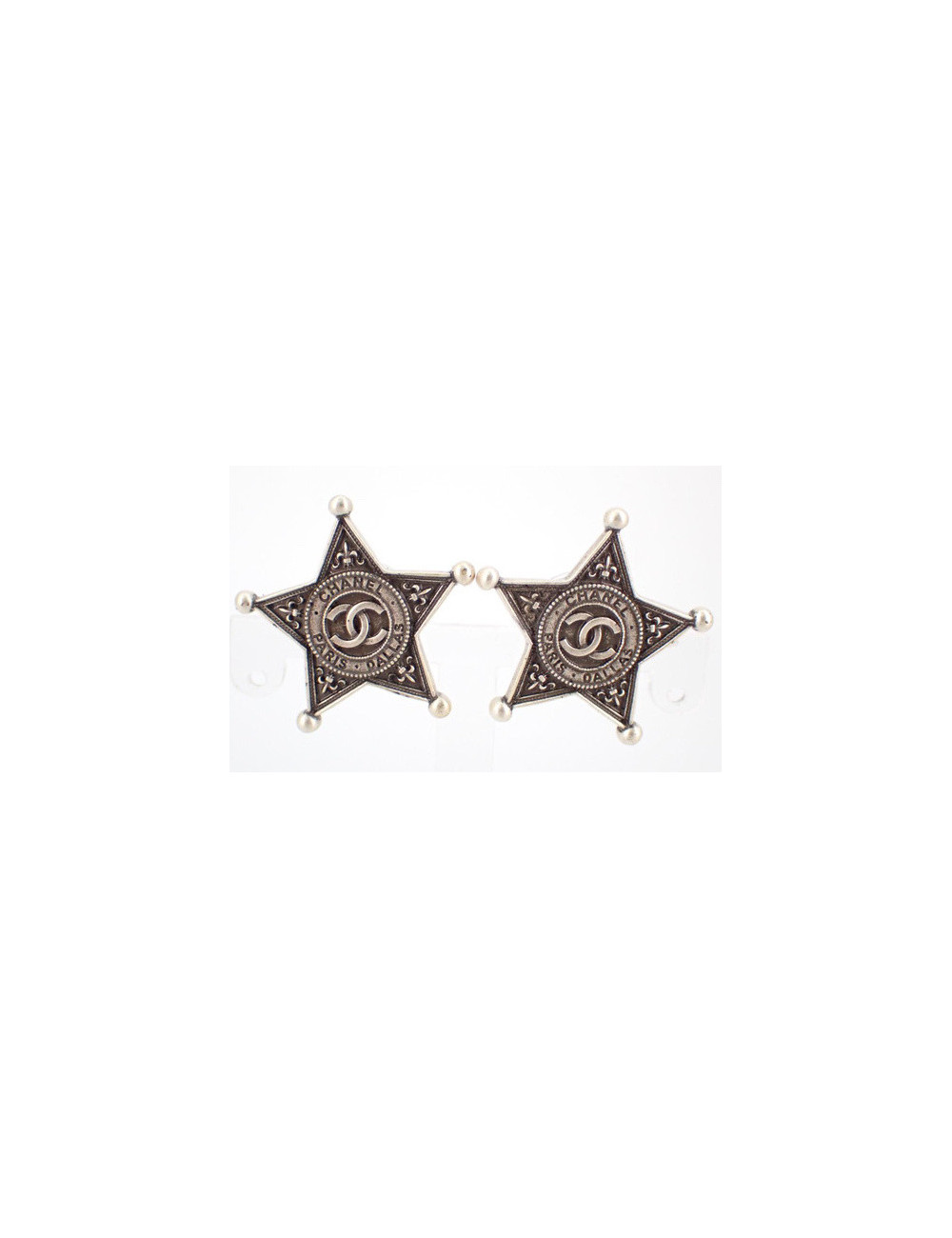 Boucles d'oreille CHANEL étoiles argent ruthénium