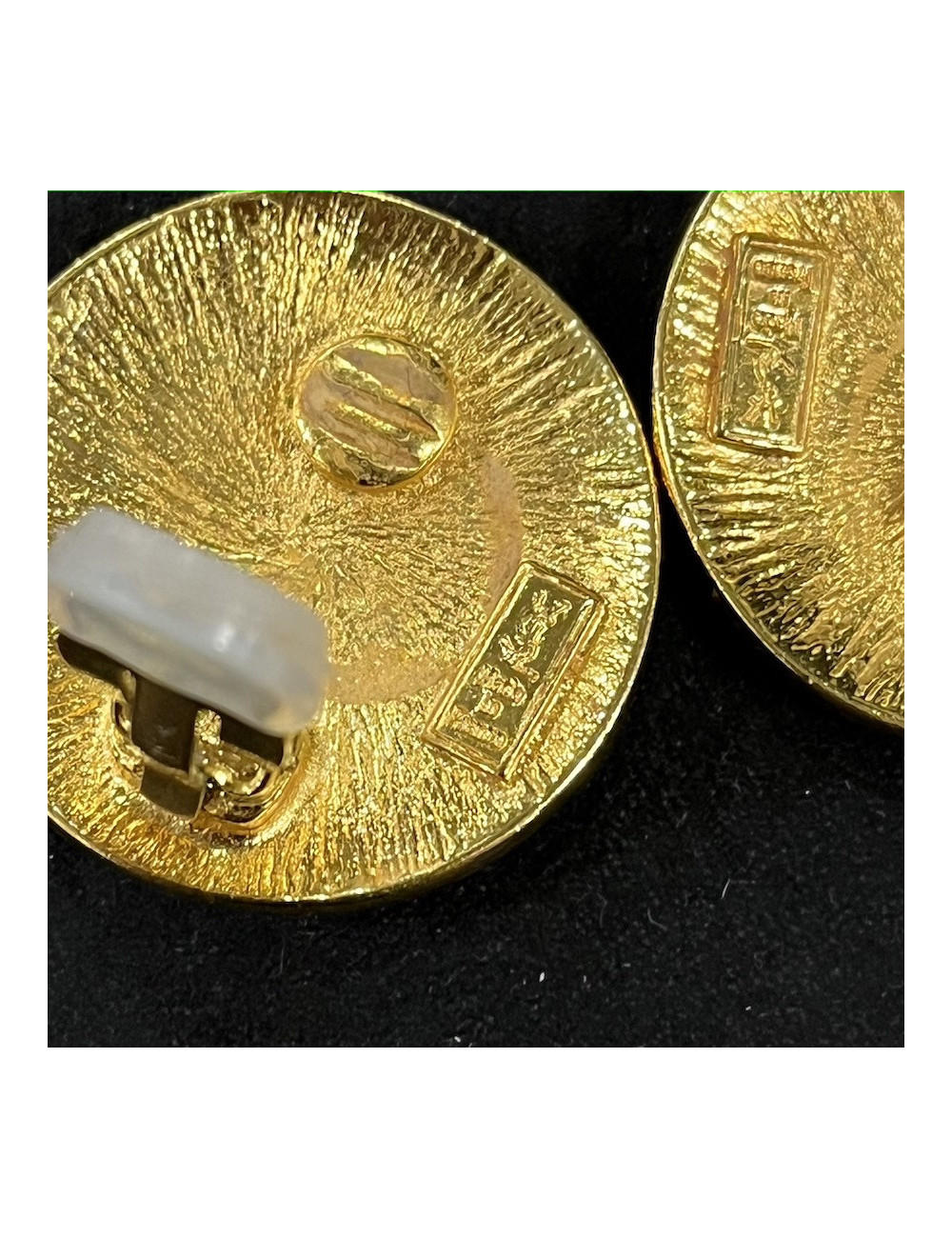 Clips d'oreille YSL rondes dorées