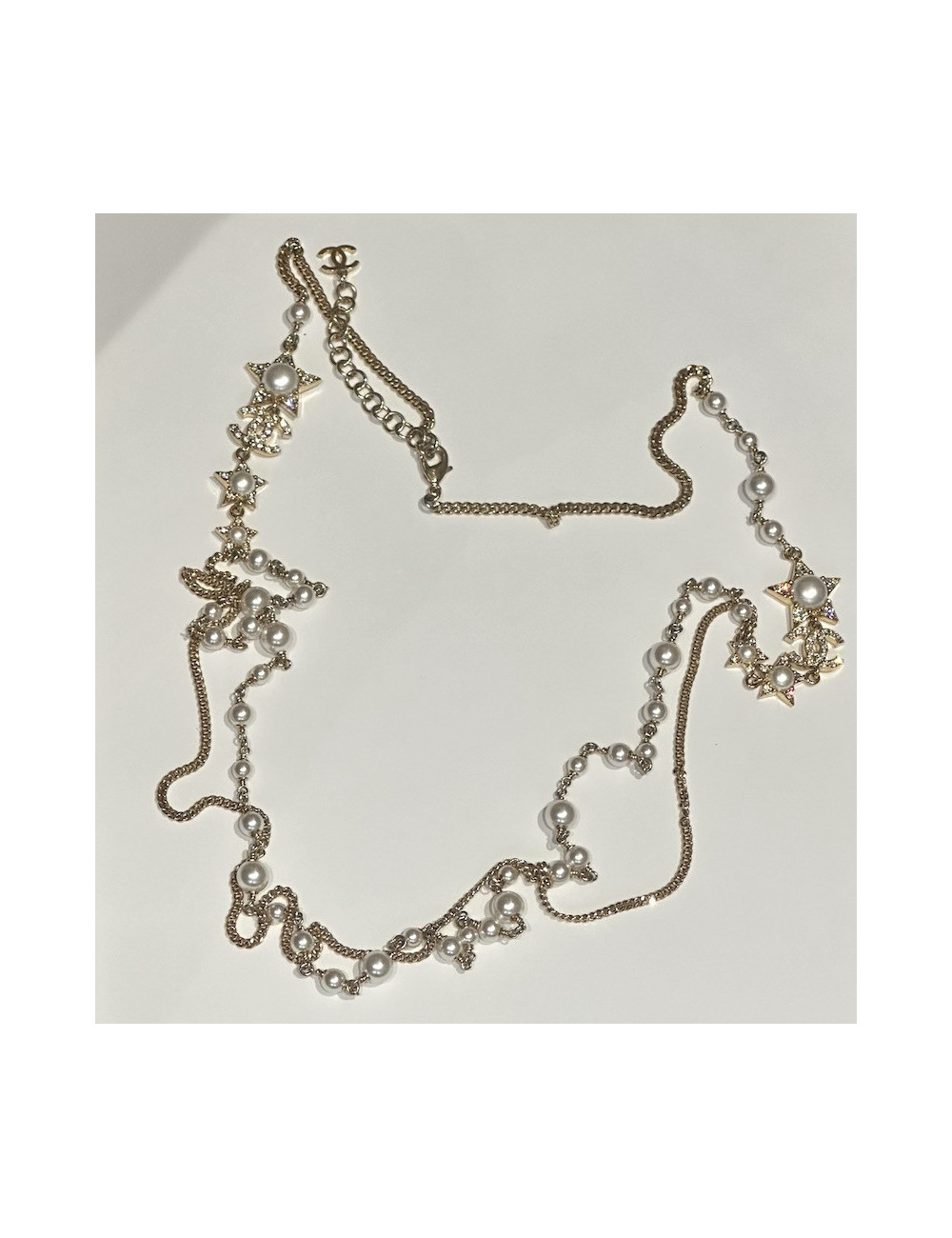 Sautoir CHANEL étoiles strassées et perles