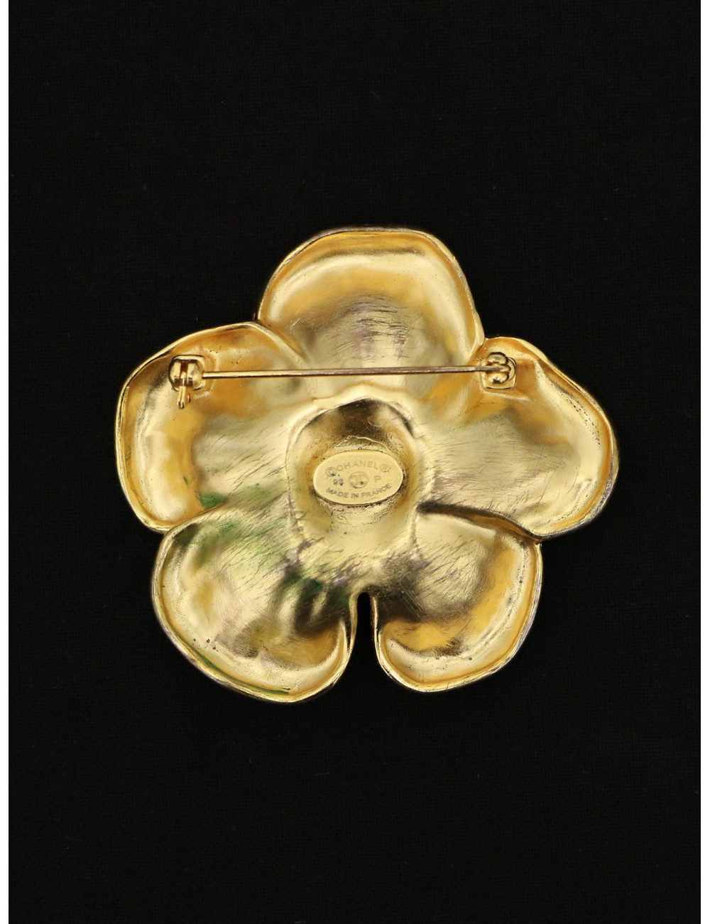 Broche camélia CHANEL dorée Vintage