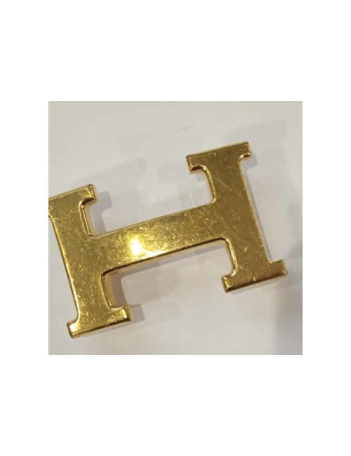 Ceinture H Hermès réversible bicolore disponible chez Valois Vintage.