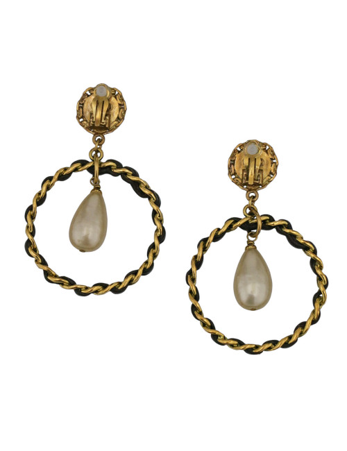 Boucles d'oreille Chanel cuir et métal doré