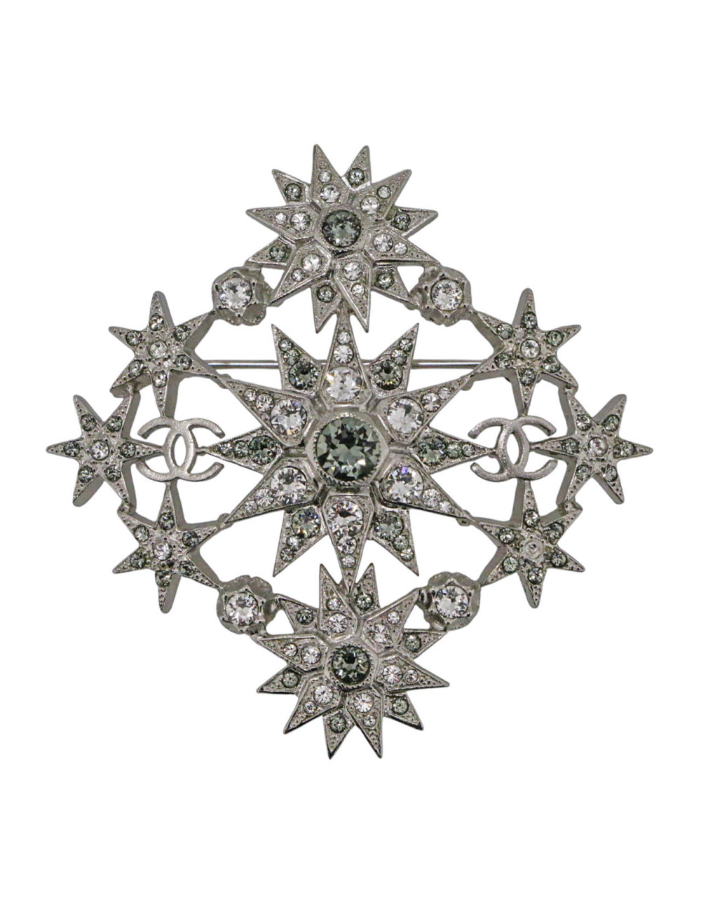 Broche Chanel étoiles métal argent et strass