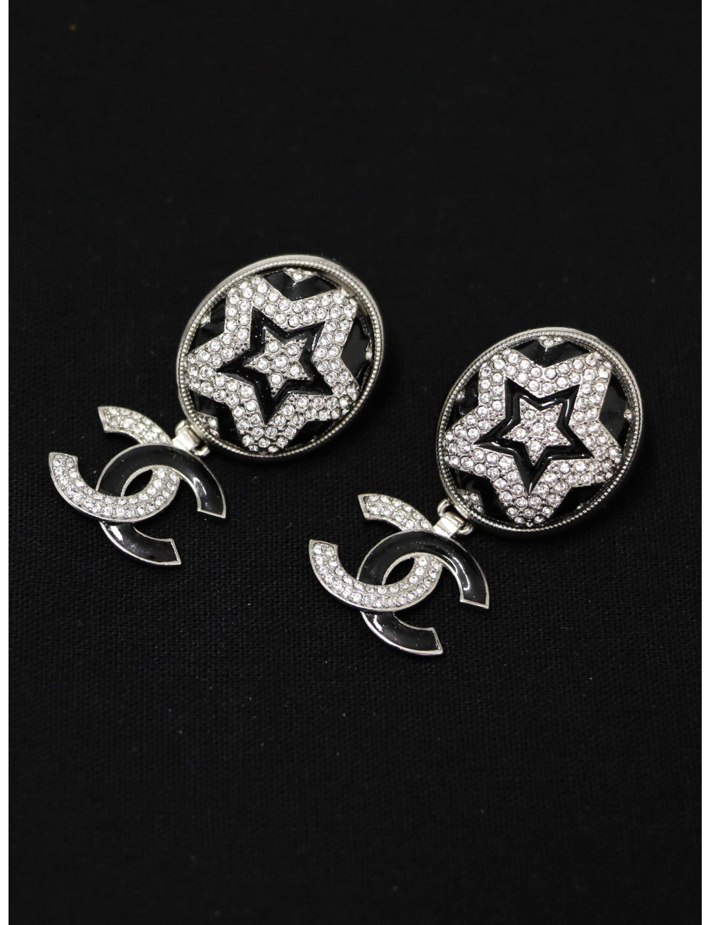Boucles d'oreilles Chanel étoiles pendantes
