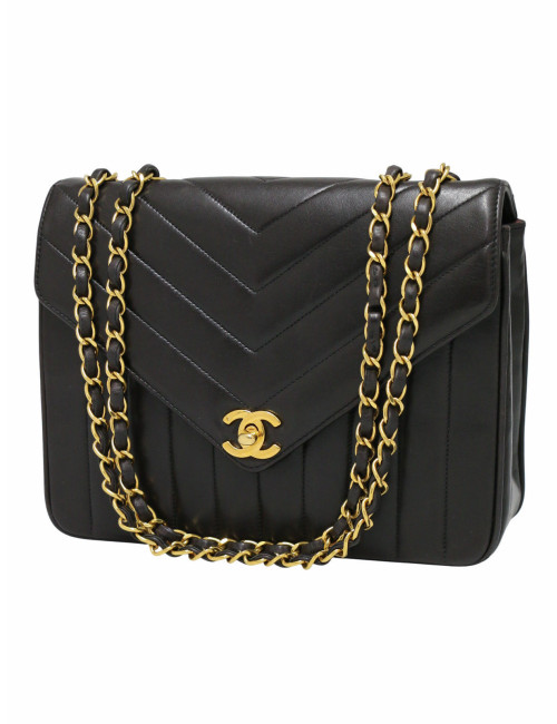 Sac noir Chanel motif chevron vintage